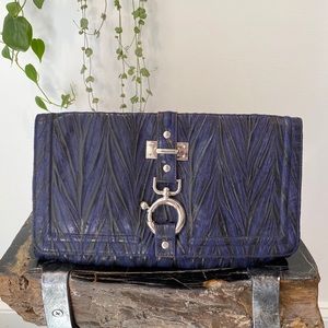 Deep purple and black textured clutch